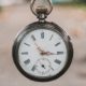 An old-fashioned wind-up pocket watch. Photo by Andrik Langfield on Unsplash